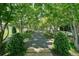 Scenic community walking path surrounded by lush trees and greenery at 10 Perimeter Summit Ne Blvd # 2207, Brookhaven, GA 30319