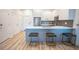 Stylish kitchen island with seating, complemented by modern appliances and sleek cabinetry at 1155 Custer Se Ave # 201, Atlanta, GA 30316