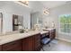 Bathroom featuring a double vanity, drawers and ample counter space at 1304 Brookhavenrun Cir, Duluth, GA 30097