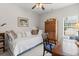 Inviting bedroom area with a bed and wooden desk at 1304 Brookhavenrun Cir, Duluth, GA 30097