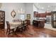 Dining room with chandelier and views of kitchen with stainless steel appliances at 1304 Brookhavenrun Cir, Duluth, GA 30097