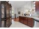 Bright kitchen and dining area with stainless steel appliances and tile flooring at 1304 Brookhavenrun Cir, Duluth, GA 30097