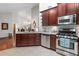 Spacious kitchen featuring stainless steel appliances and hardwood floors at 1304 Brookhavenrun Cir, Duluth, GA 30097