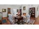 Cozy living room features a fireplace, hardwood floors, and elegant furnishings at 1304 Brookhavenrun Cir, Duluth, GA 30097