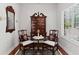 Cozy sitting room featuring hardwood floors, large window, and elegant decor at 1304 Brookhavenrun Cir, Duluth, GA 30097