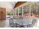 Beautiful sunroom with expansive windows that offer serene views and plenty of natural light for relaxation at 1304 Brookhavenrun Cir, Duluth, GA 30097