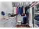 Organized walk-in closet with shelving, hanging space, and drawers at 1304 Brookhavenrun Cir, Duluth, GA 30097
