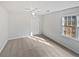 Inviting bedroom with neutral carpet, window views, and closet space at 1307 Chandler Nw Ct, Acworth, GA 30102