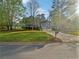 Charming two-story home with attached two car garage and landscaped front yard at 1307 Chandler Nw Ct, Acworth, GA 30102