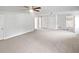 Large carpeted living room with multiple doors and access points, light and airy at 1307 Chandler Nw Ct, Acworth, GA 30102