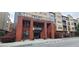 Exterior shot of the apartment building's entrance with 