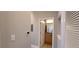 Hallway view leading to a bathroom and featuring a storage closet at 400 17Th St # 1114, Atlanta, GA 30318