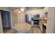 Bright kitchen features stainless steel appliances, granite countertops, and island at 400 17Th St # 1114, Atlanta, GA 30318