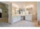 Primary bathroom featuring double sinks and access to the bedroom at 1010 Forest Creek Dr, Canton, GA 30115