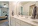 Bright bathroom features a double vanity with brushed nickel fixtures at 1010 Forest Creek Dr, Canton, GA 30115
