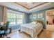 Bright bedroom featuring a large window with natural light and a comfortable bed at 1010 Forest Creek Dr, Canton, GA 30115