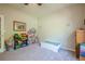 Bright bedroom with neutral walls and carpet, offering ample space for a variety of furniture at 1010 Forest Creek Dr, Canton, GA 30115