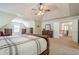 Bedroom showcasing neutral paint, carpet, and access to the hallway at 1010 Forest Creek Dr, Canton, GA 30115