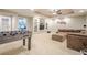 Spacious recreation room with custom shelving, and a foosball table at 1010 Forest Creek Dr, Canton, GA 30115