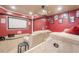 Home theater with a projector screen and comfortable seating at 1010 Forest Creek Dr, Canton, GA 30115