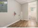 Laundry hookups in utility room. Doorway leads to adjacent bathroom at 2914 Stanton Se Rd, Conyers, GA 30094