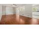 Inviting living room with hardwood floors and a painted brick fireplace at 2914 Stanton Se Rd, Conyers, GA 30094