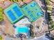 Aerial view of community amenities including pool, playground, and tennis and basketball courts at 3448 Clear Stream Ne Run, Auburn, GA 30011