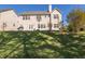 Wide backyard featuring a lawn and a basketball hoop and grill, perfect for outdoor activities at 3448 Clear Stream Ne Run, Auburn, GA 30011