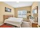 Comfortable bedroom with natural light, simple decor, and carpeted floors at 3448 Clear Stream Ne Run, Auburn, GA 30011