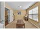 Bright office space with large windows, neutral carpet, and space for a large desk at 3448 Clear Stream Ne Run, Auburn, GA 30011