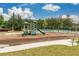 Community playground with slides, swings, and a basketball court offers space for outdoor activities at 3448 Clear Stream Ne Run, Auburn, GA 30011