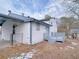 Side view of the home's backyard featuring a deck, some bare ground, and some fencing at 2637 Sol Ct, Ellenwood, GA 30294