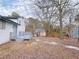 Expansive backyard with mature trees, offering a serene outdoor space with a small deck at 2637 Sol Ct, Ellenwood, GA 30294