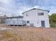 Rear exterior view of the home showcasing a deck and level backyard with some fencing at 2637 Sol Ct, Ellenwood, GA 30294