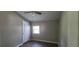 Cozy bedroom with natural light from the window and wood-look floors at 2917 Joe Jerkins Blvd, Austell, GA 30106