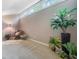 Bright room with carpeting and large windows provides a cozy seating area with natural light and plants at 5276 Weatherwood Trce, Marietta, GA 30068