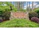 Stone monument sign for Willow Point community, surrounded by lush landscaping and green foliage at 5276 Weatherwood Trce, Marietta, GA 30068