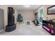 Fully equipped exercise room with modern equipment and natural light at 5276 Weatherwood Trce, Marietta, GA 30068