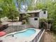 This house has a pool, fenced yard, back deck and a 2 car garage at 5276 Weatherwood Trce, Marietta, GA 30068