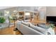 Spacious living room featuring hardwood floors, open layout, and a clear view into the dining area at 5276 Weatherwood Trce, Marietta, GA 30068