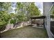 Spacious backyard with a cozy patio and a pergola, perfect for outdoor gatherings at 542 Broughton Dr, Canton, GA 30114