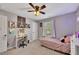 Inviting bedroom showcasing decor, a cozy workspace and natural light at 542 Broughton Dr, Canton, GA 30114