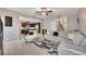 Cozy living room with open access to the kitchen, comfortable seating, and stylish decor at 542 Broughton Dr, Canton, GA 30114