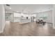 Bright open-concept kitchen, dining, and living space perfect for entertaining and gatherings at 6340 Arlington Cir, Cumming, GA 30041