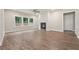 Inviting living room with a cozy fireplace and large windows for natural light at 6340 Arlington Cir, Cumming, GA 30041