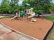 Community playground featuring slides and climbing equipment for children to enjoy in a safe environment at 6340 Arlington Cir, Cumming, GA 30041