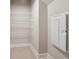 Pantry featuring metal shelving and tile floors at 6340 Arlington Cir, Cumming, GA 30041