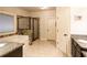 Bathroom features a tub, glass shower, granite countertops, and tile floors at 632 Creekside Trce, Covington, GA 30014