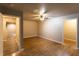 Bedroom with wood-look floors and neutral paint at 632 Creekside Trce, Covington, GA 30014