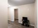 Neutral bedroom with wood-look floors and a TV at 632 Creekside Trce, Covington, GA 30014